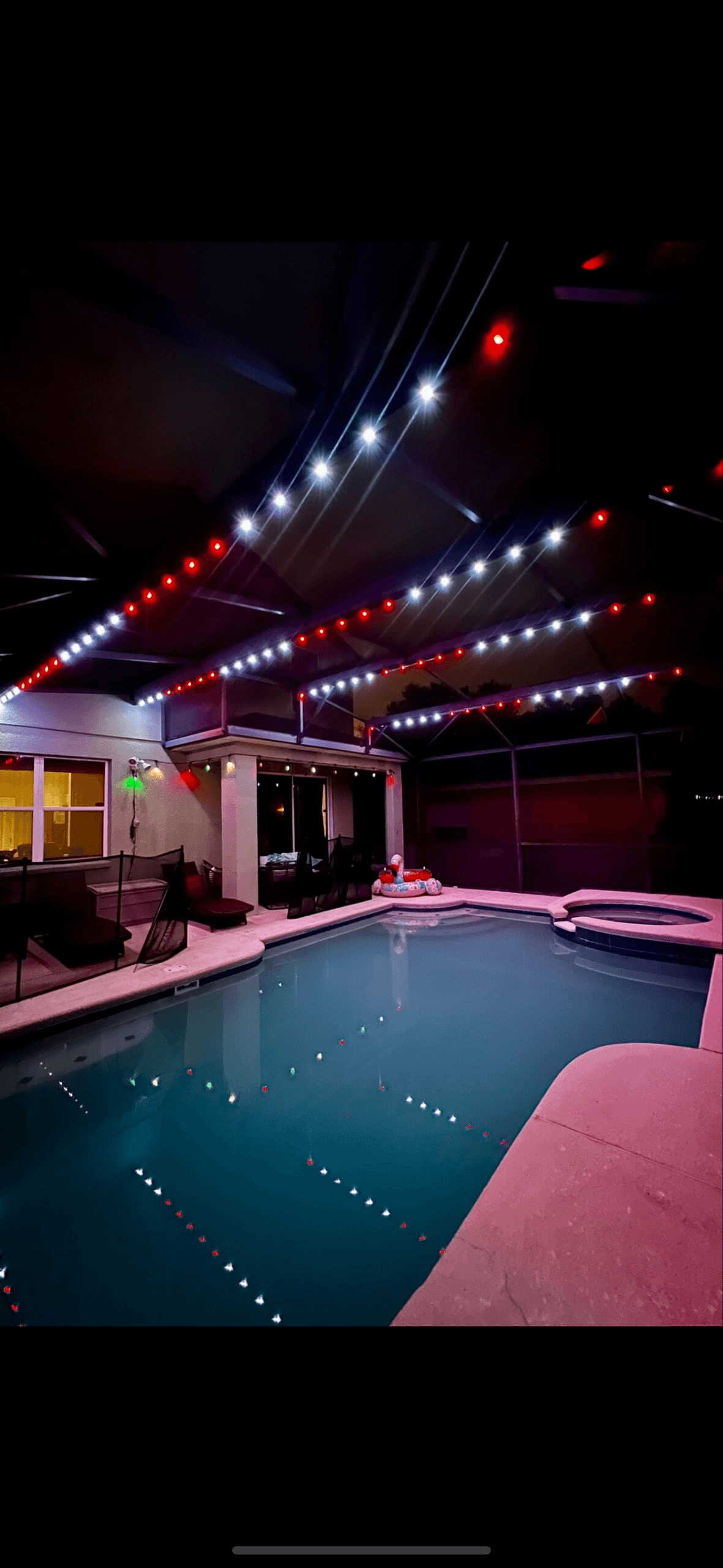 Pool area lit up at night!